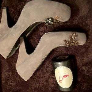 Light brown suede heels.